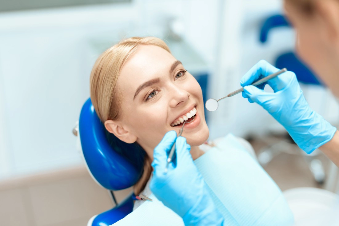 Patient showing a confident cosmetic dentistry result